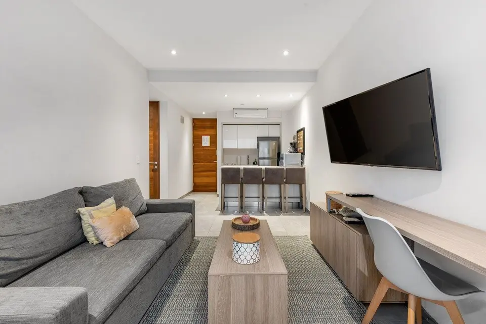 Stay cool indoors with your favorite shows, just meters from the water
