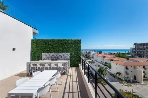 Rooftop oasis with ocean views.