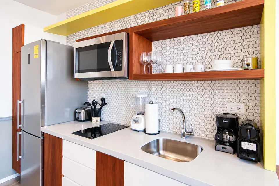 The kitchen area is fully equipped to make you feel at home