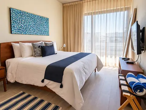 Spacious, fully equipped room (HD TV, A/C, king-size bed, and ceiling fan)