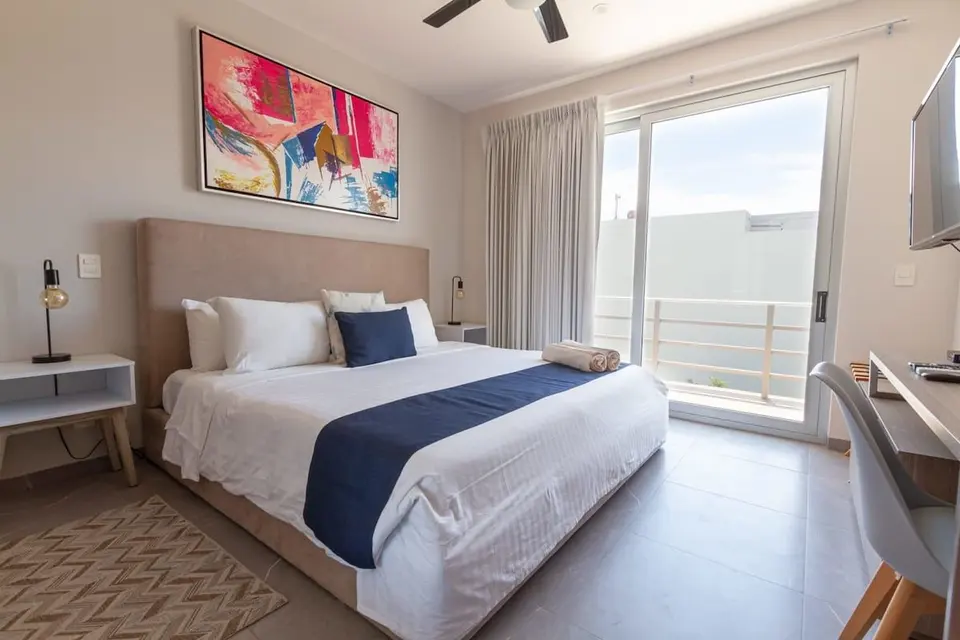 Stylish bedroom with king-size bed.