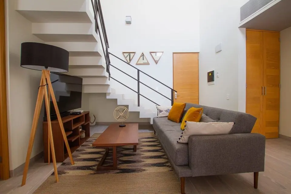 Relax on the comfy sofa in our spacious living room.