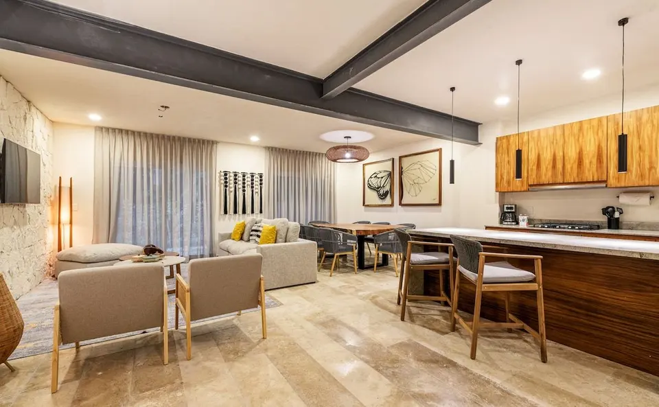 The kitchen area is connected to the living room and dining area, allowing you not to miss a moment