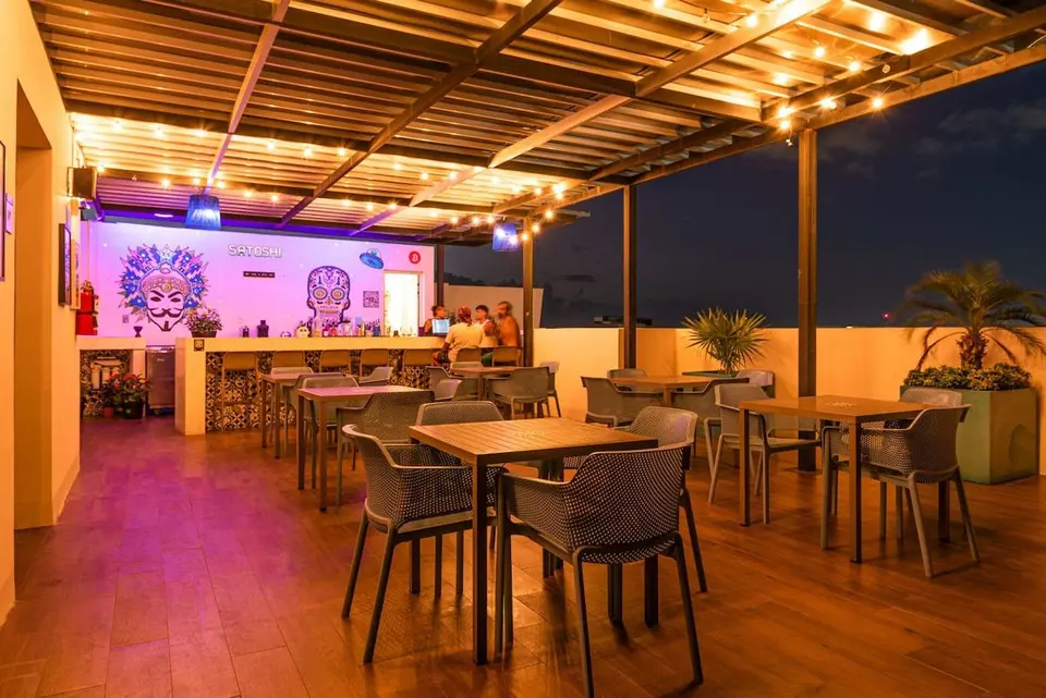 Enjoy a drink at our rooftop bar.