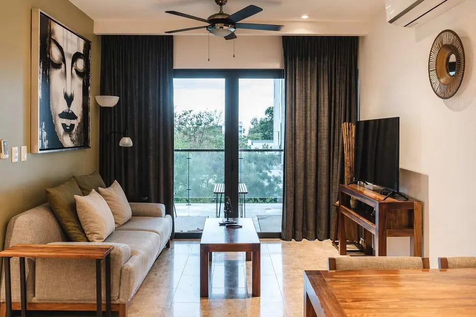 Relax in our stylish living room, complete with comfy seating.