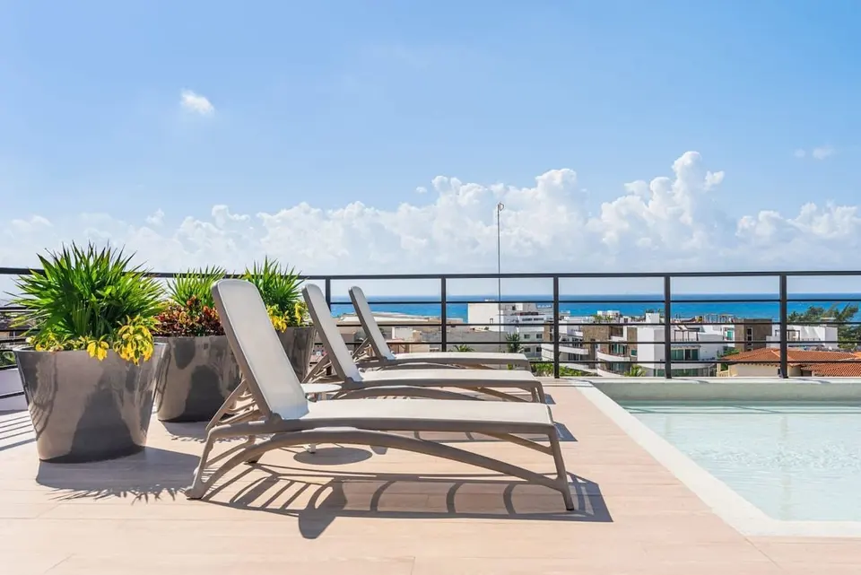 Relax on sun loungers; enjoy the view.