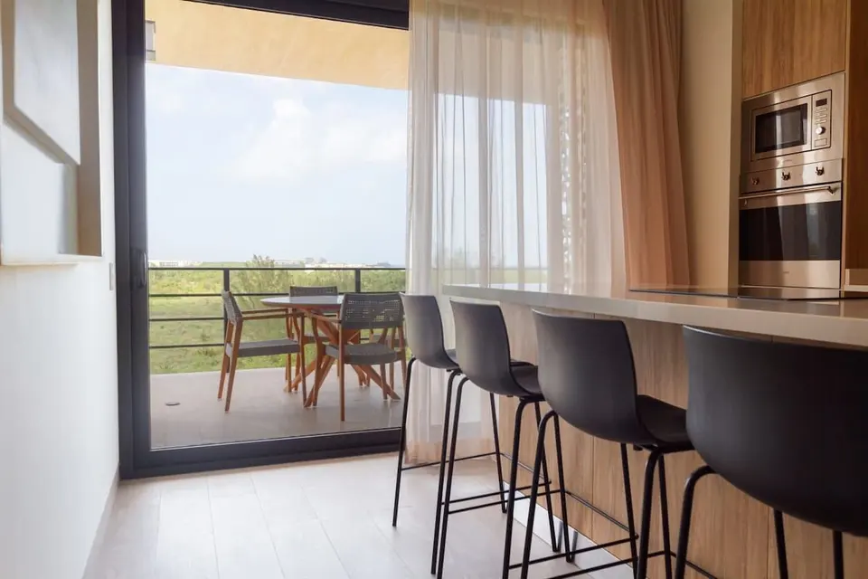 You can enjoy your meals with the best view. The kitchen is fully equipped with everything you need to feel at home.