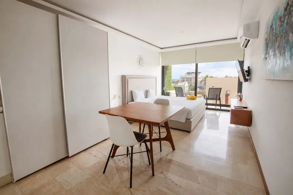 Studio with city views and workspace.