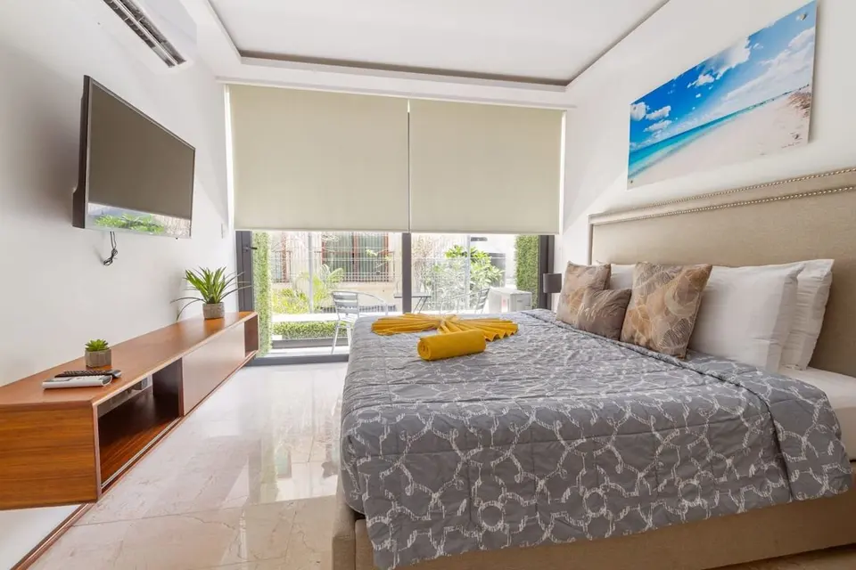 Stylish bedroom with king-size bed.