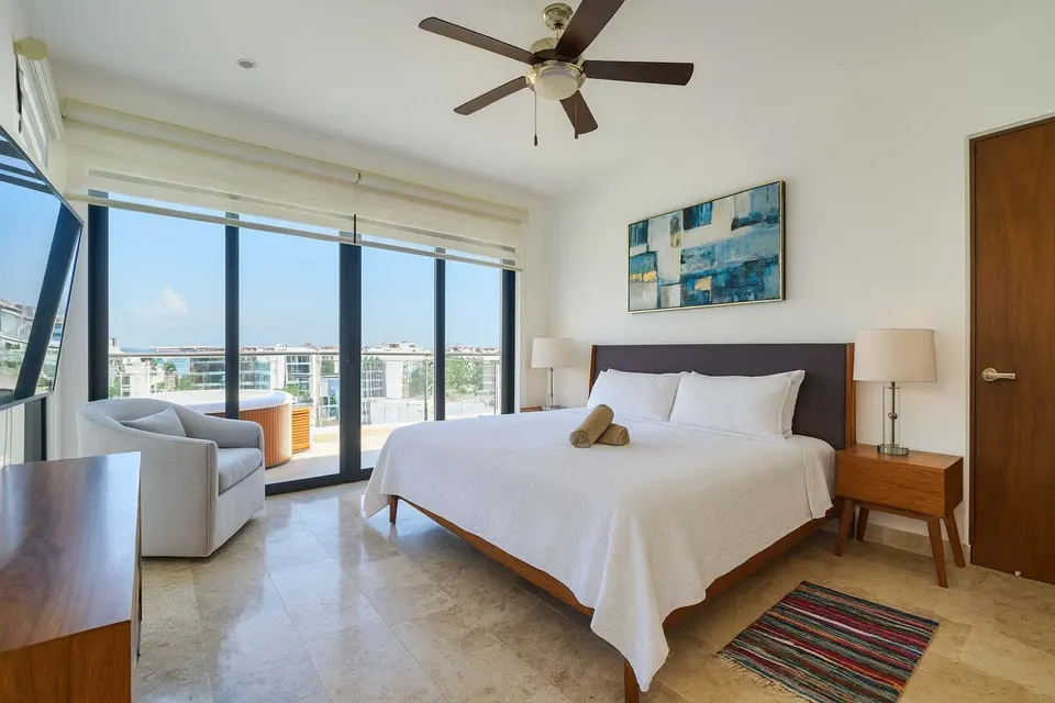 Luxurious bedroom with a king-size bed.
